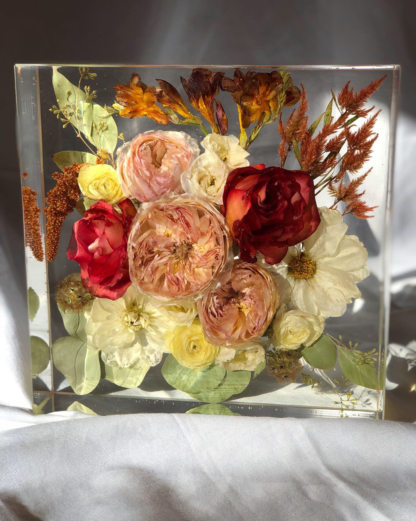 This bouquet preservation block is from a Maine bridal bouquet and features roses, peonies, and ranunculus..